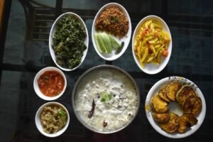 pakhala bhata served with curd with variety types of vegetables fry ,chutney etc,which is comfortable food for every Odia