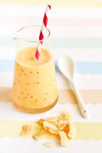 vibrant and refreshing mango smoothie in a jar