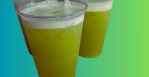 3 glasses of fresh, golden sugarcane juice served with ice cubes, showcasing its natural sweetness and vibrant color.