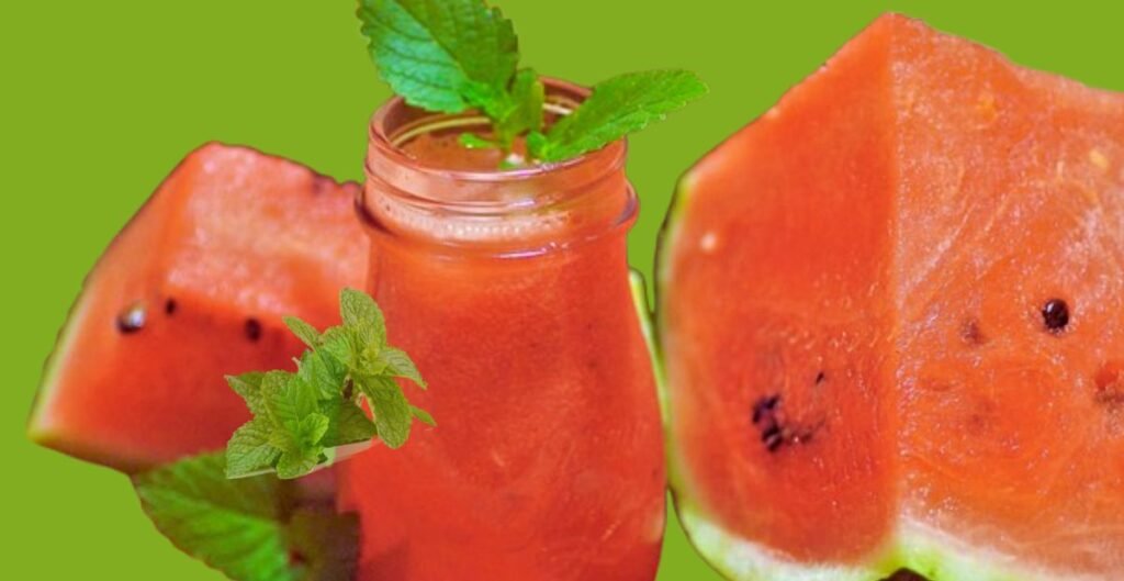 A refreshing bottle of watermelon juice garnished with fresh mint leaves, surrounded by juicy watermelon slices, perfect for a summer drink