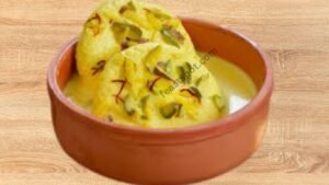 Soft rasmalai soaked in flavored milk